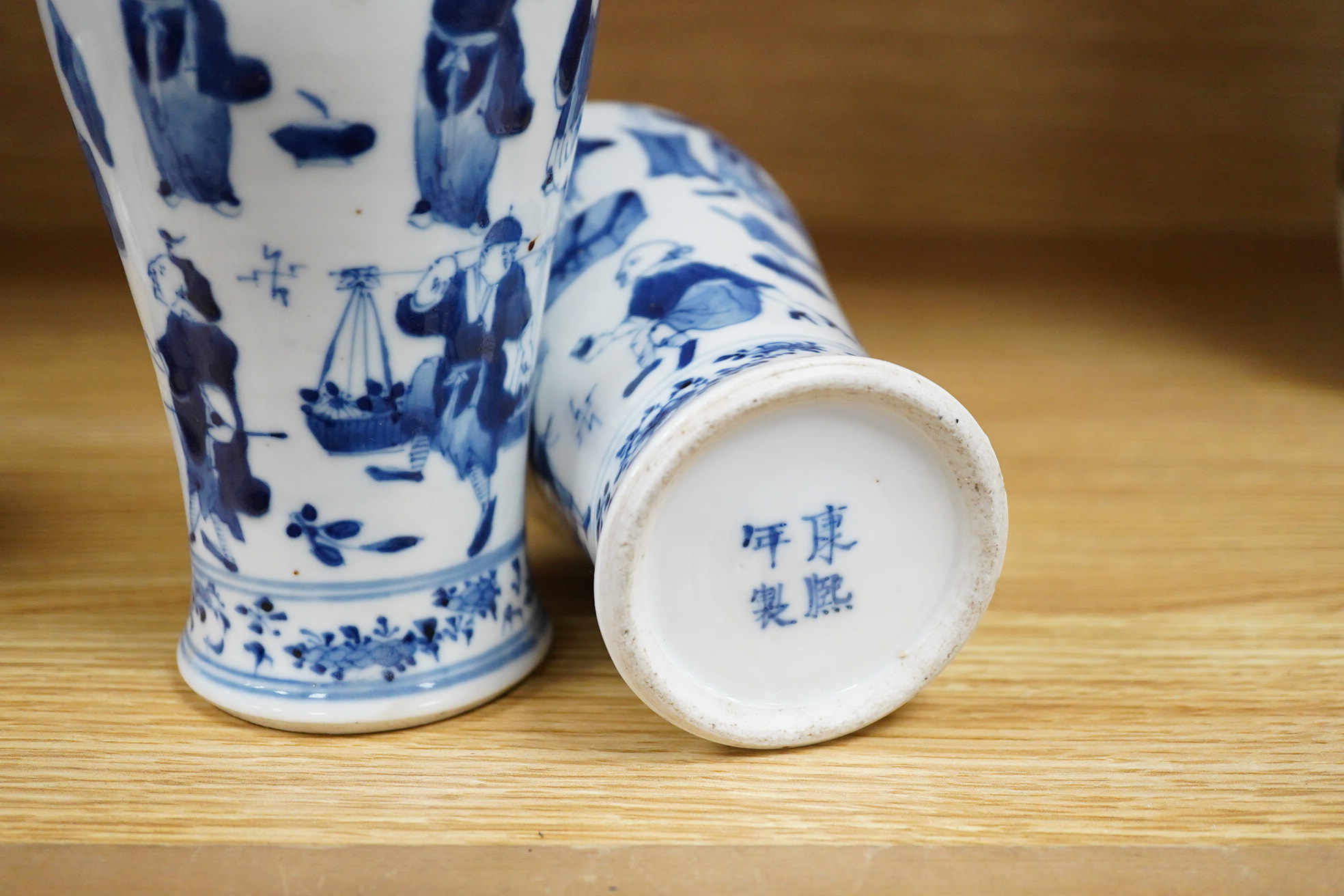 A pair of 19th century Chinese blue and white vases and covers. 22.5cm high